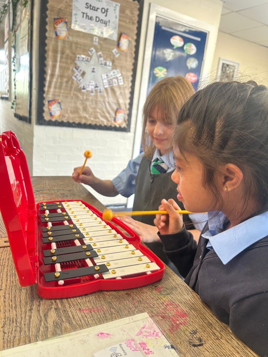 Learning the glockenspiel in a music lesson