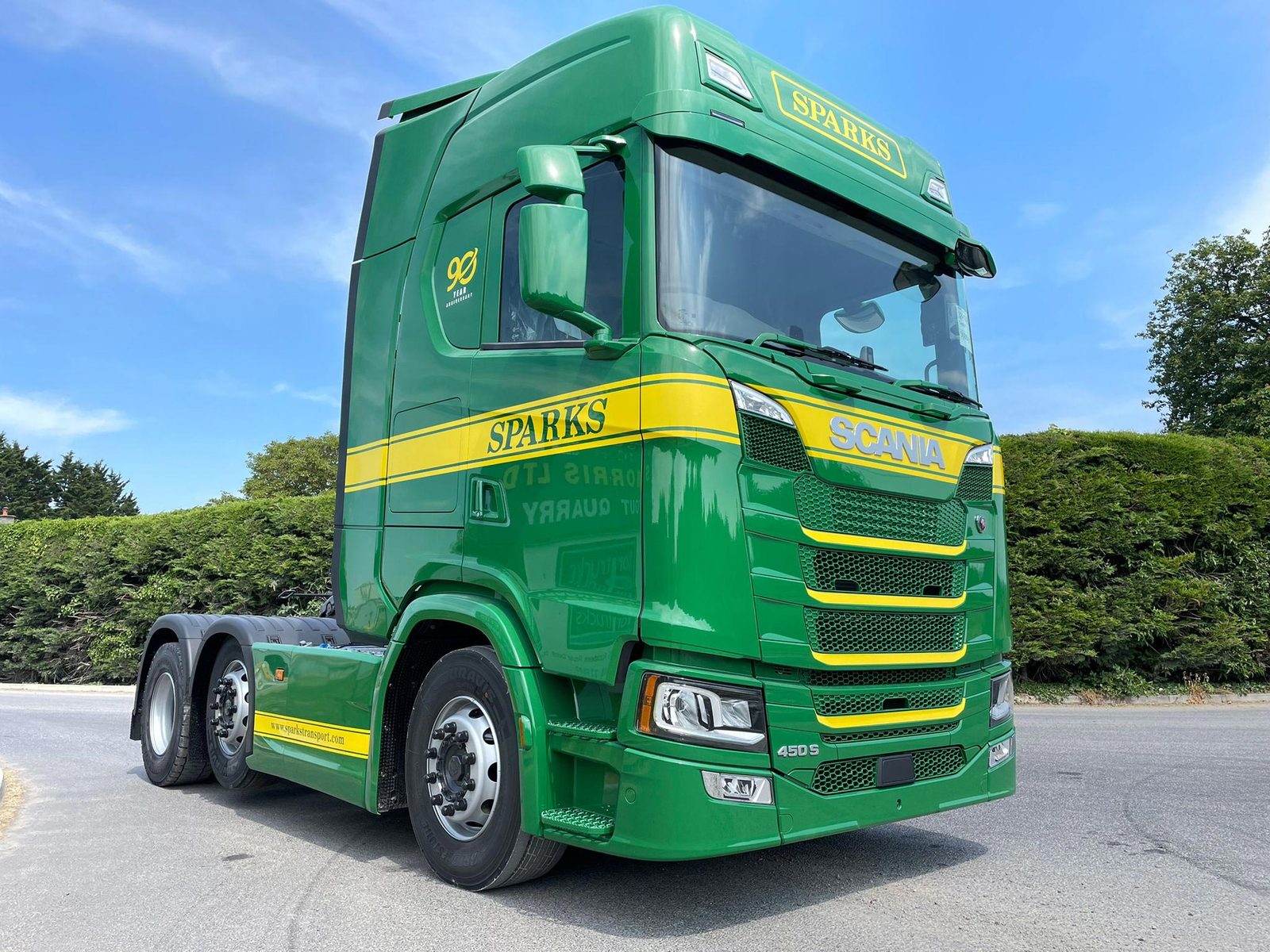 A new Sparks Scania tractor unit in green and yellow livery