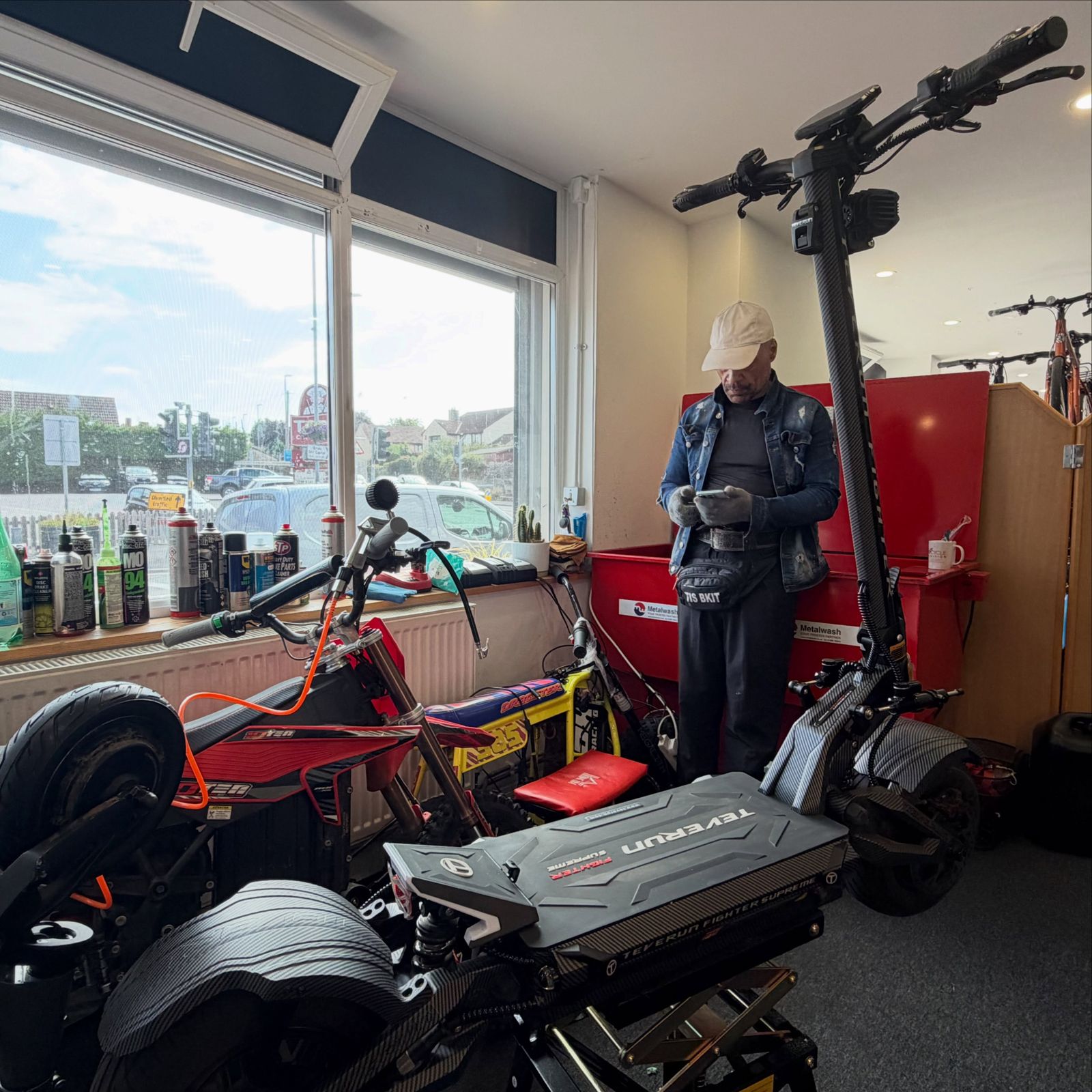 A Teverun scooter on the bench in the Volt workshop