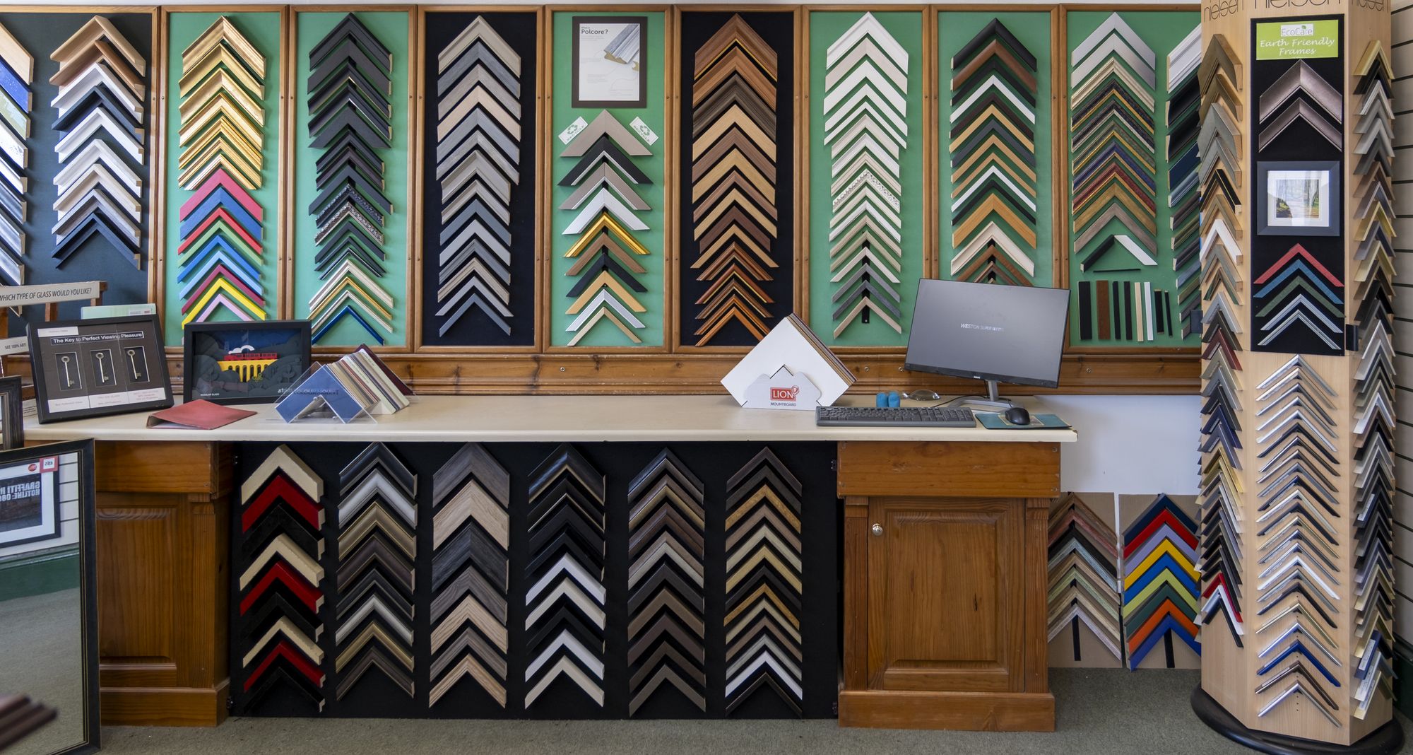 The moulding sample wall and counter in the Weston Super Frames shop